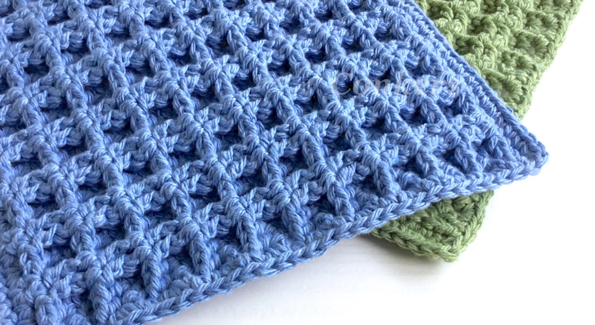 Crocheted dishcloths in a waffle stitch, made in green and blue recycled cotton