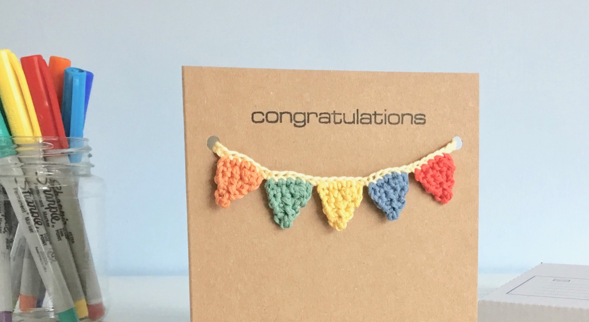 Recycled kraft greetings card with crocheted bunting embellishment
