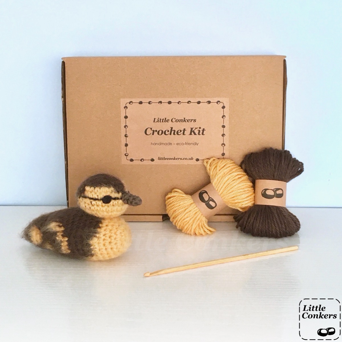 Crochet kit to make a mallard duckling in a brown box