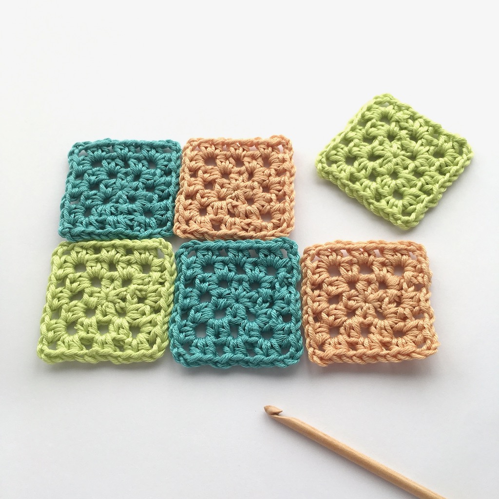 Mini crocheted granny squares with htr or hdc