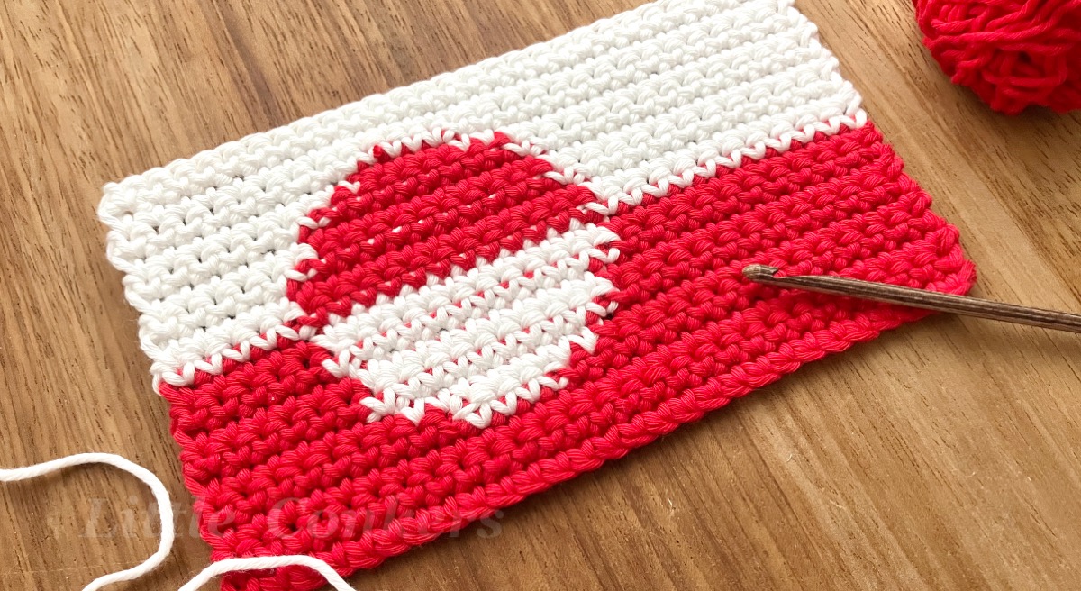 Greenland flag crocheted in red and white yarn